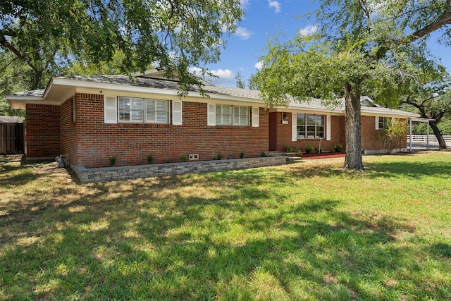 ranch-style house with a front yard