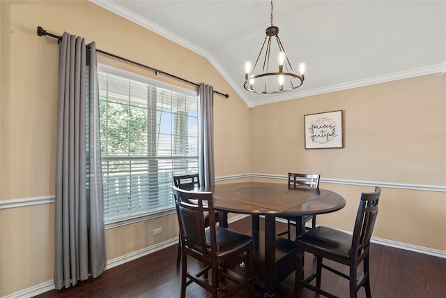 dining room with crown molding, dark hardwood / wood-style flooring, lofted ceiling, and a notable chandelier