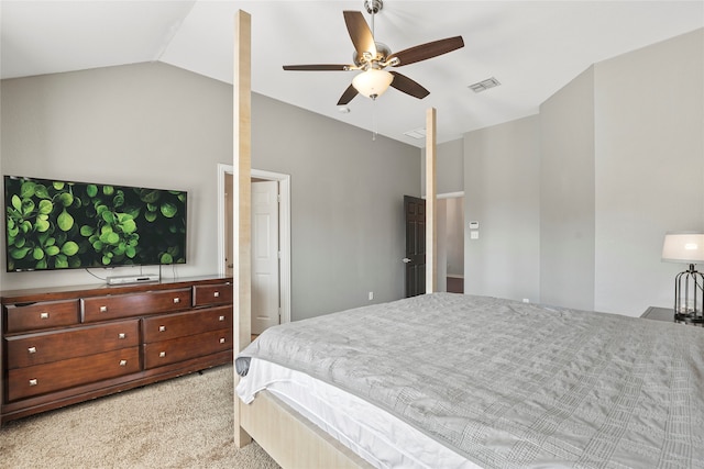 carpeted bedroom featuring ceiling fan and vaulted ceiling