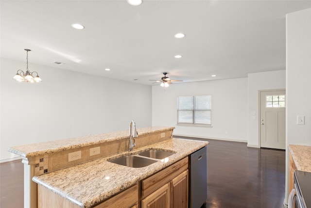 kitchen with a center island with sink, a healthy amount of sunlight, stainless steel dishwasher, and sink