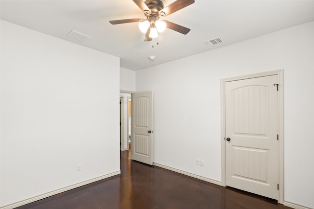 interior space with ceiling fan