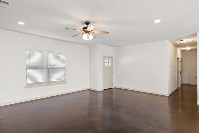 empty room featuring ceiling fan