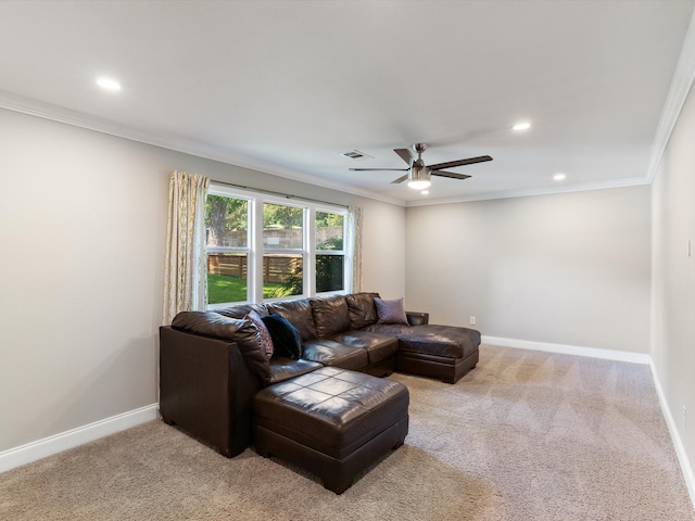 living room featuring light colored carpet, crown molding, and ceiling fan