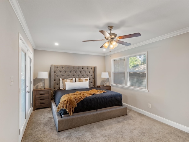 bedroom featuring light carpet, ornamental molding, and ceiling fan