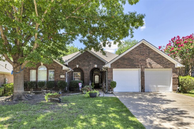 single story home featuring a garage and a front lawn