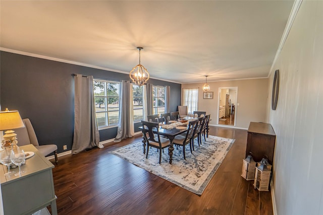 dining area with ornamental molding, dark hardwood / wood-style floors, a wealth of natural light, and a notable chandelier