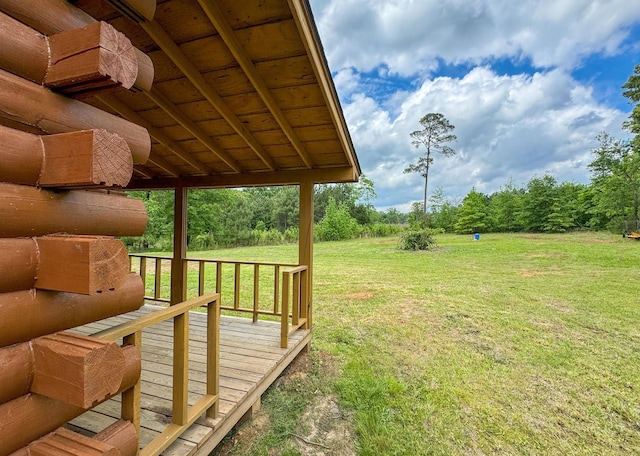 view of yard featuring a wooden deck