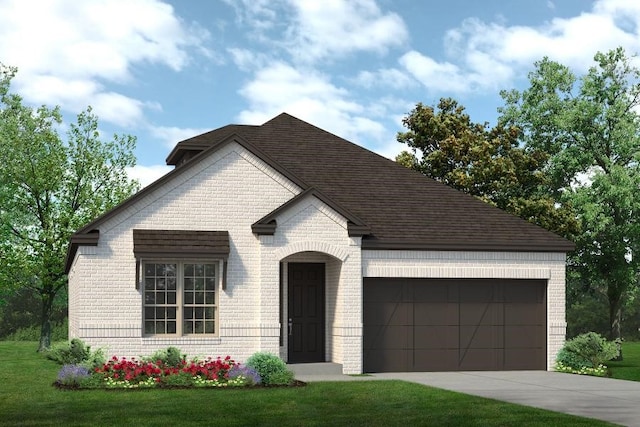 view of front of house with a garage and a front yard