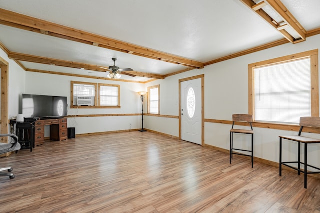 living room with ceiling fan, ornamental molding, hardwood / wood-style floors, and a healthy amount of sunlight