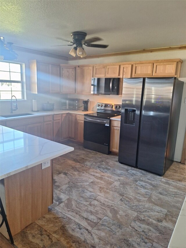 kitchen with black electric cooktop, crown molding, sink, and white cabinetry