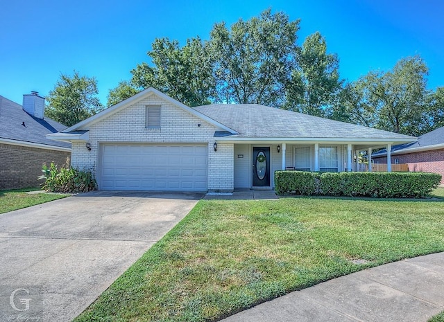 single story home with a garage and a front lawn