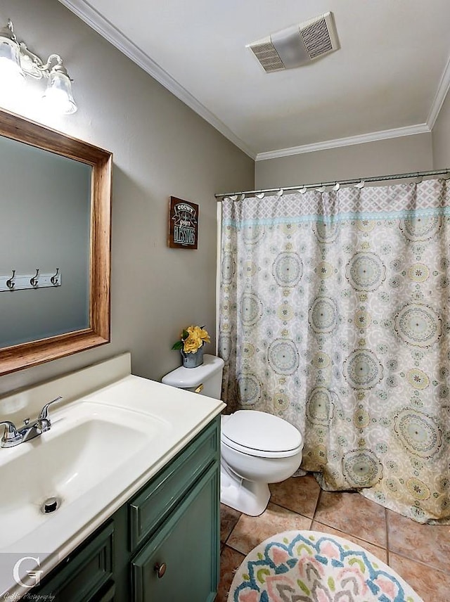 bathroom with tile patterned floors, ornamental molding, toilet, and vanity