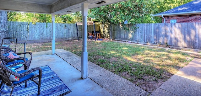 view of yard with a patio area