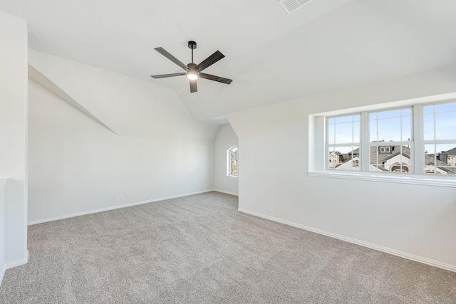 bonus room with carpet floors, ceiling fan, and lofted ceiling