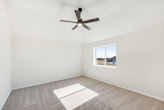 empty room featuring light carpet and ceiling fan