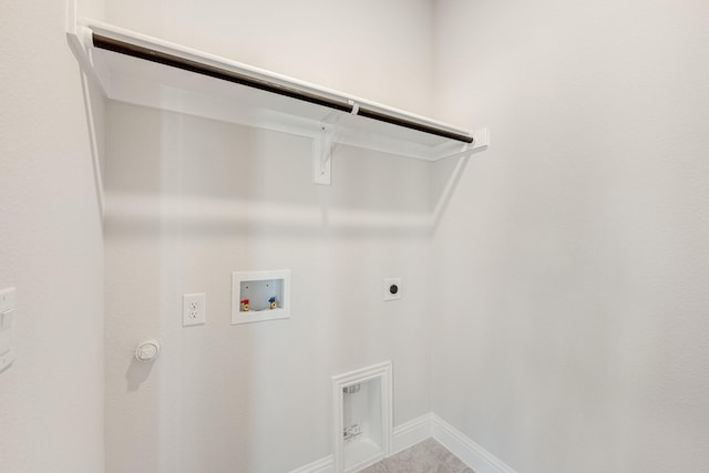 laundry area with hookup for an electric dryer, tile patterned flooring, and hookup for a washing machine