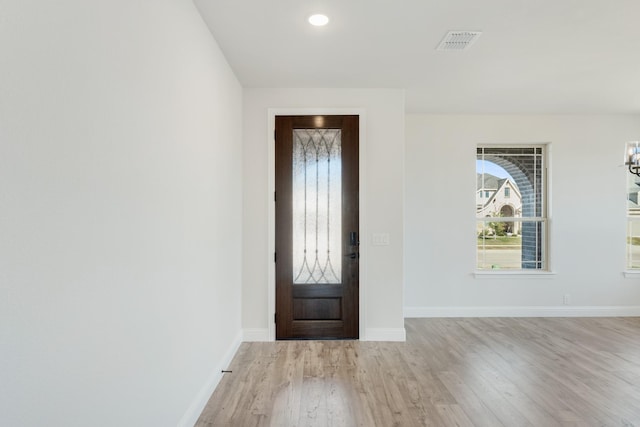 foyer with light hardwood / wood-style flooring