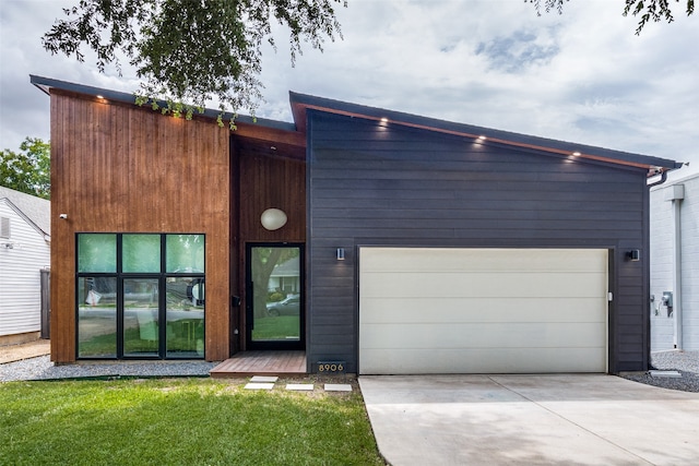 contemporary home with a garage