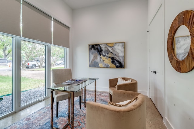 home office featuring a high ceiling