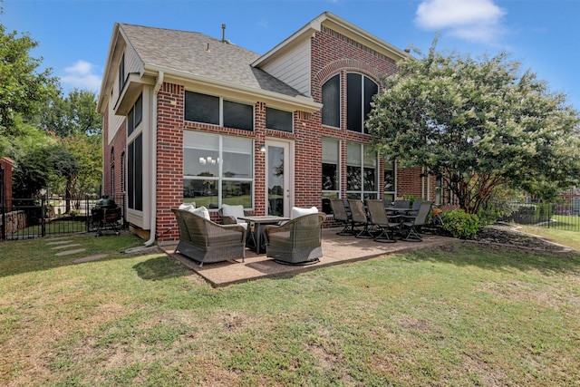 back of property featuring a patio, an outdoor living space, and a yard