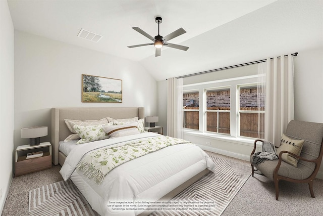 carpeted bedroom featuring ceiling fan and vaulted ceiling