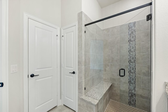 bathroom featuring an enclosed shower