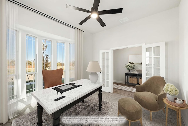 office area with ceiling fan and french doors