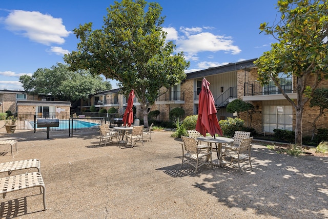 exterior space featuring a community pool