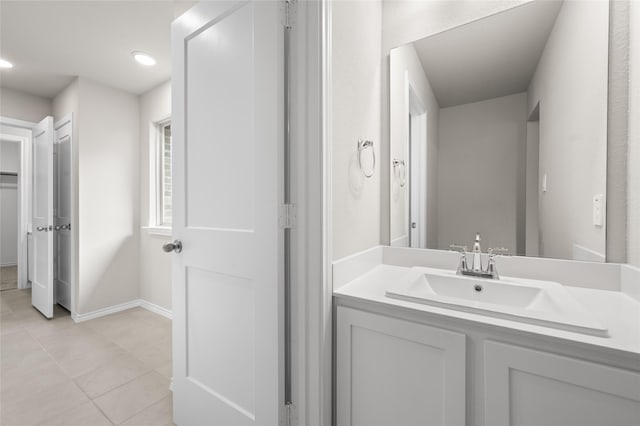 bathroom with vanity and tile patterned floors