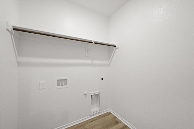 laundry room with washer hookup, hardwood / wood-style floors, gas dryer hookup, and hookup for an electric dryer