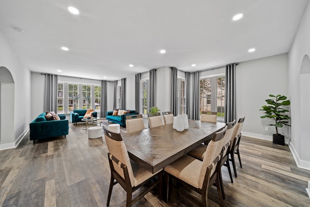 dining area with wood-type flooring