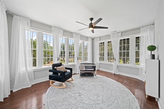 sunroom / solarium with ceiling fan