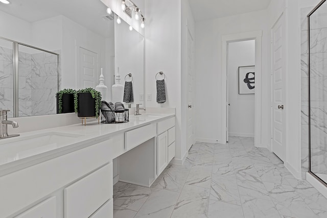 bathroom with a shower with shower door and vanity