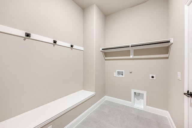 laundry area featuring washer hookup, electric dryer hookup, gas dryer hookup, and light tile patterned floors