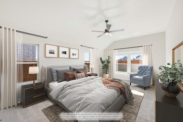 carpeted bedroom with ceiling fan and lofted ceiling