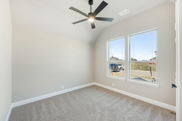 additional living space featuring carpet flooring, ceiling fan, and vaulted ceiling