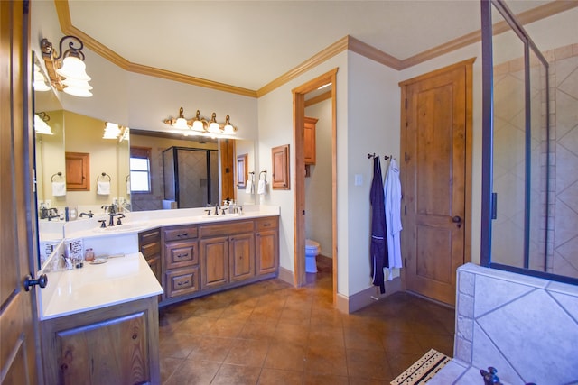 bathroom featuring tile patterned flooring, a shower with door, toilet, vanity, and ornamental molding