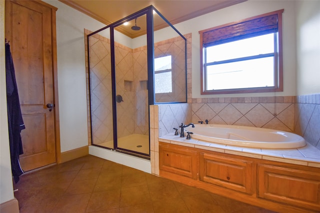 bathroom featuring crown molding, tile patterned flooring, and shower with separate bathtub