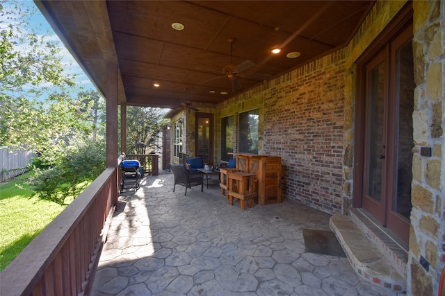 view of patio with ceiling fan