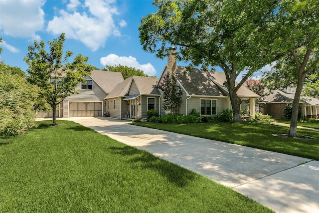 view of front facade with a front lawn and a garage