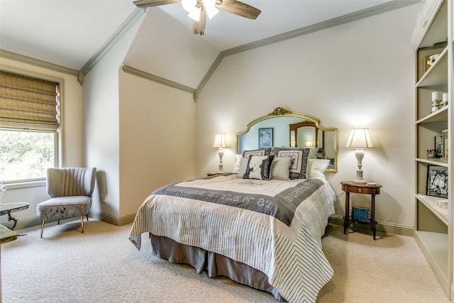 bedroom featuring ceiling fan, vaulted ceiling, carpet floors, and ornamental molding