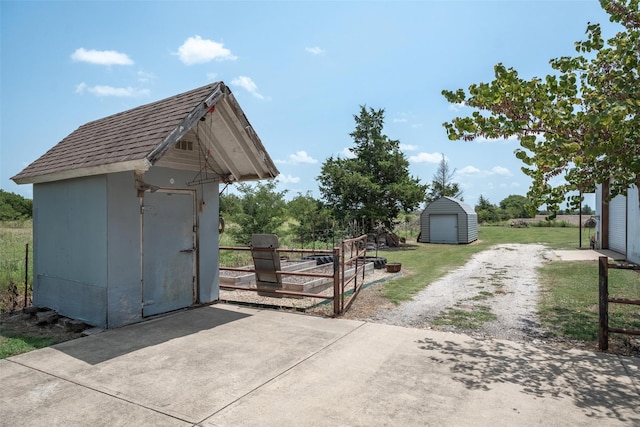 view of outdoor structure with a yard