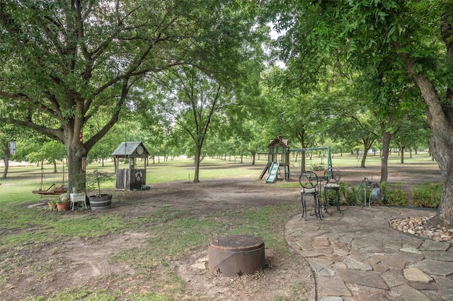 view of yard with a playground