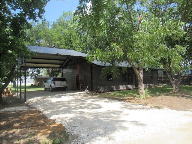 view of front facade featuring a carport