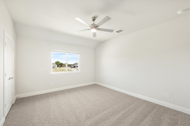 carpeted empty room with ceiling fan