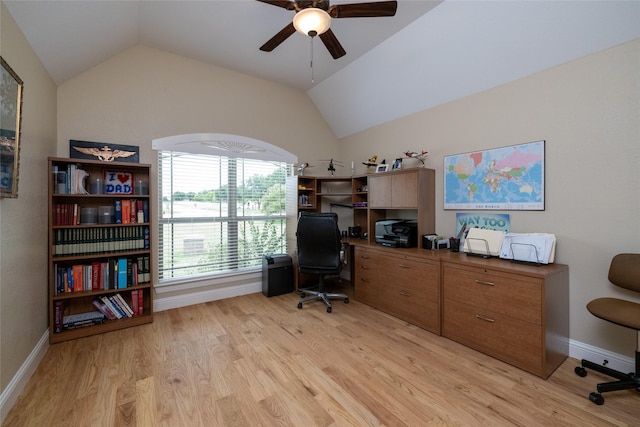 office space featuring light wood-type flooring, ceiling fan, lofted ceiling, and baseboards