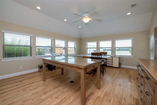 home office featuring vaulted ceiling, recessed lighting, visible vents, and light wood-style floors