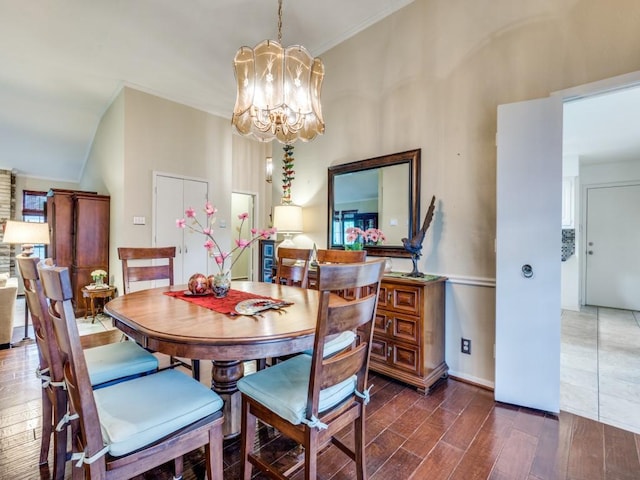 dining space with a chandelier