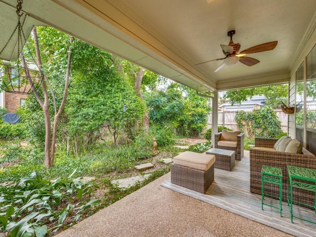 view of patio / terrace featuring ceiling fan, a deck, and outdoor lounge area