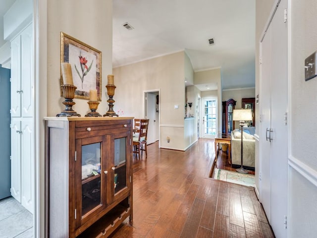 corridor featuring hardwood / wood-style floors